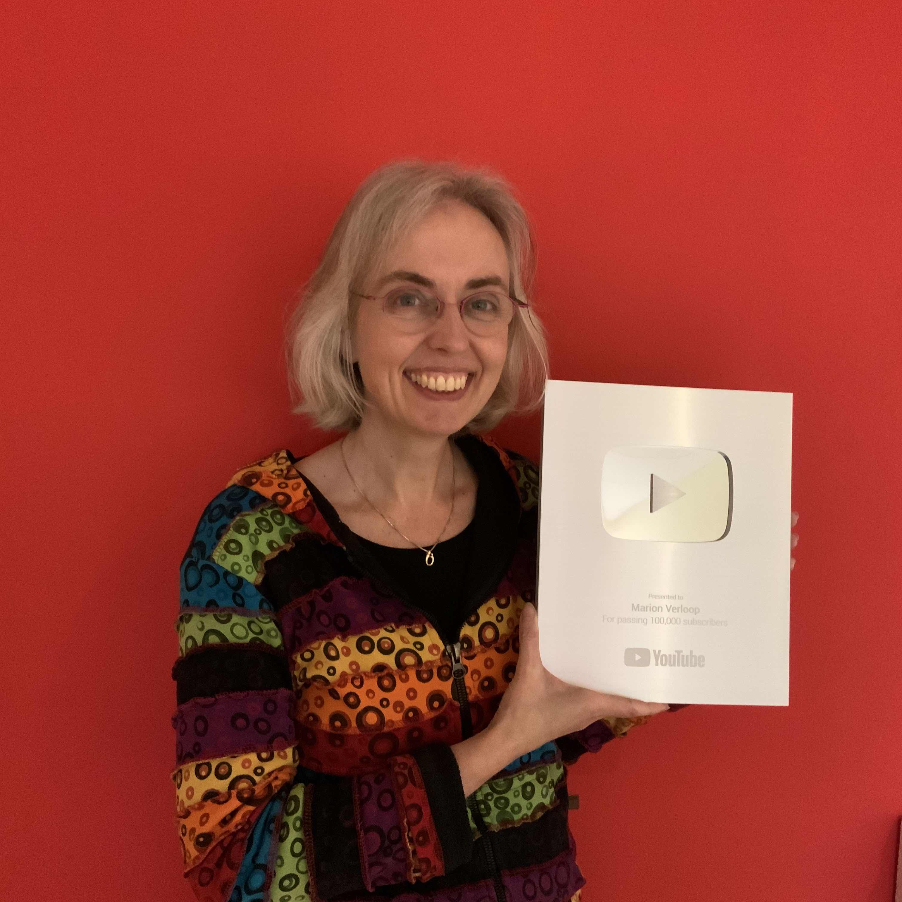 YouTube Silver Play Button awarded to crochet and weaving creator Marion Verloop.